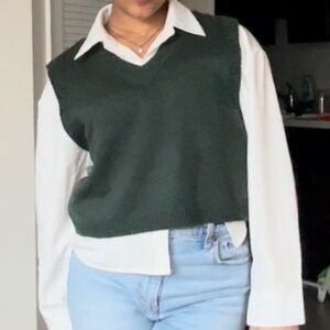 green sweater vest